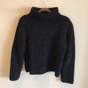Black speckled turtleneck sweater